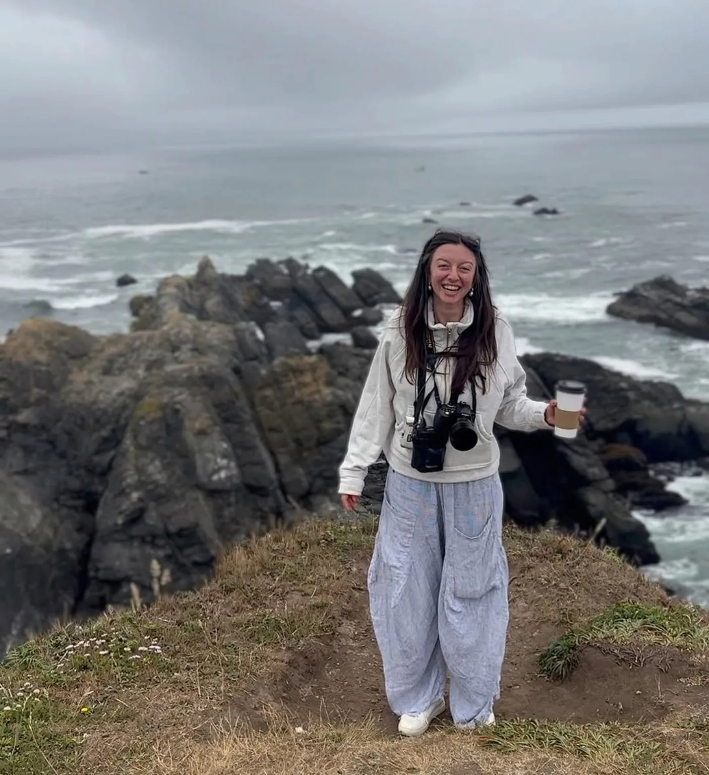 Alli Halliday with cameras on the Oregon coast